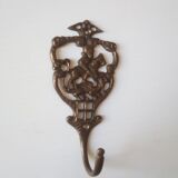 Old brass patère coat rack