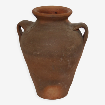 Old little terracotta jar