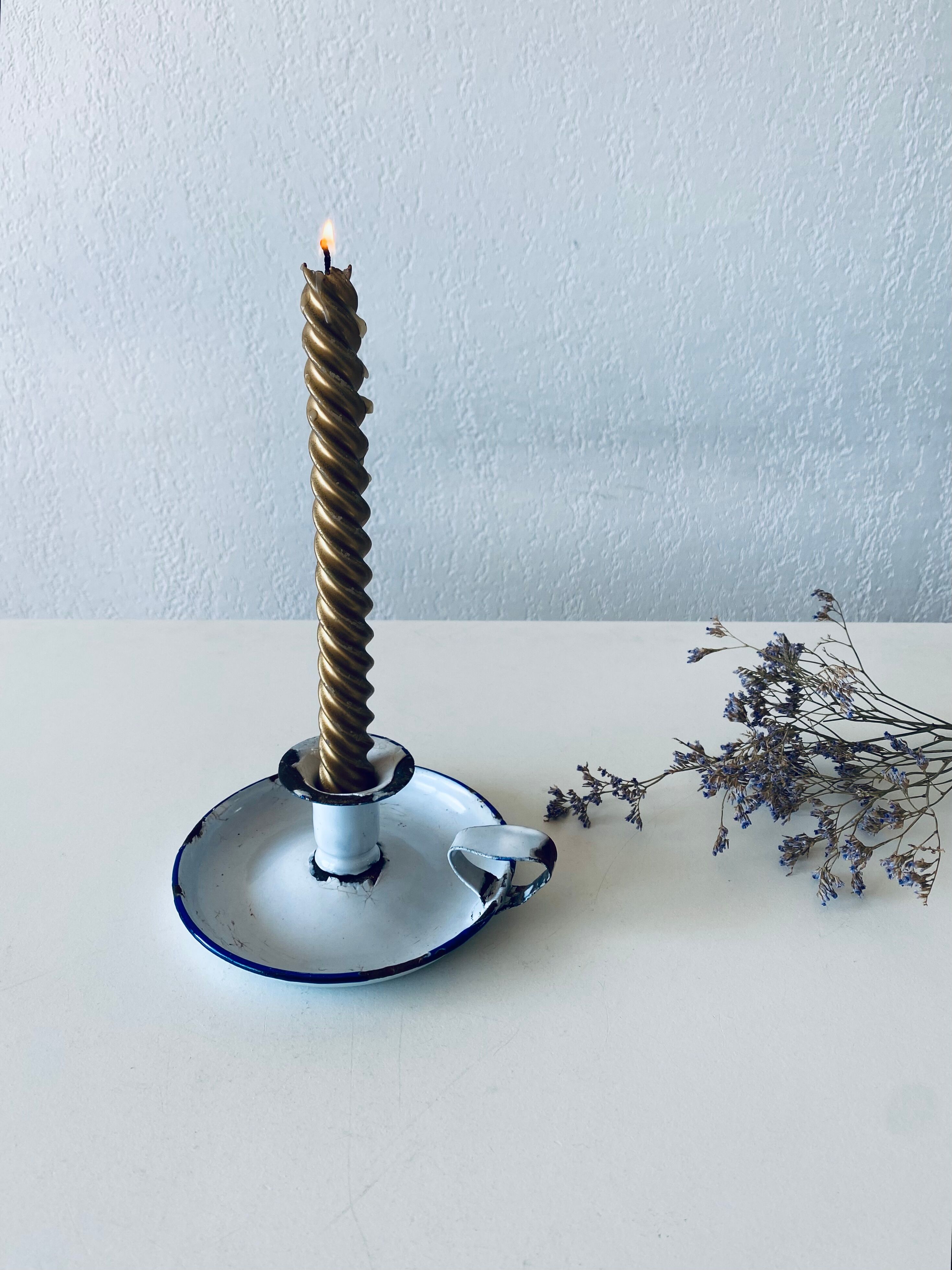 Antique candle holder in white and blue enamelled metal