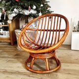 Swivel rattan armchair