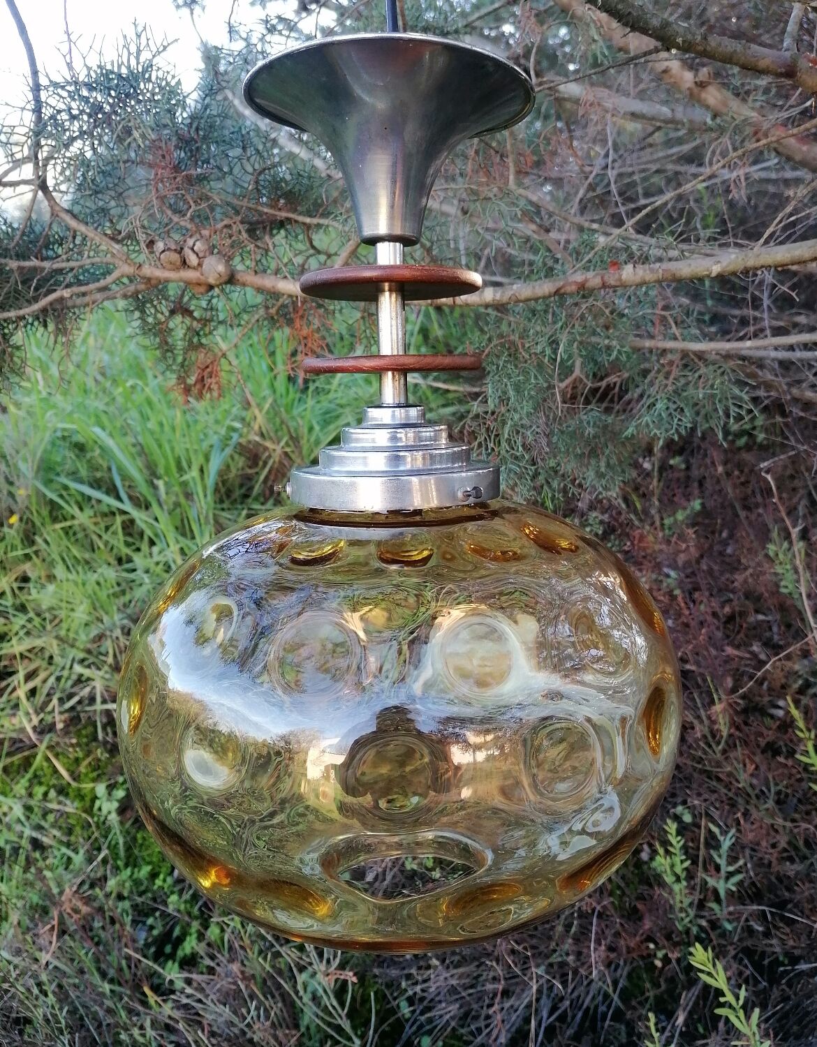 Vintage suspension ball in amber glass