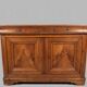 Very old in solid walnut.