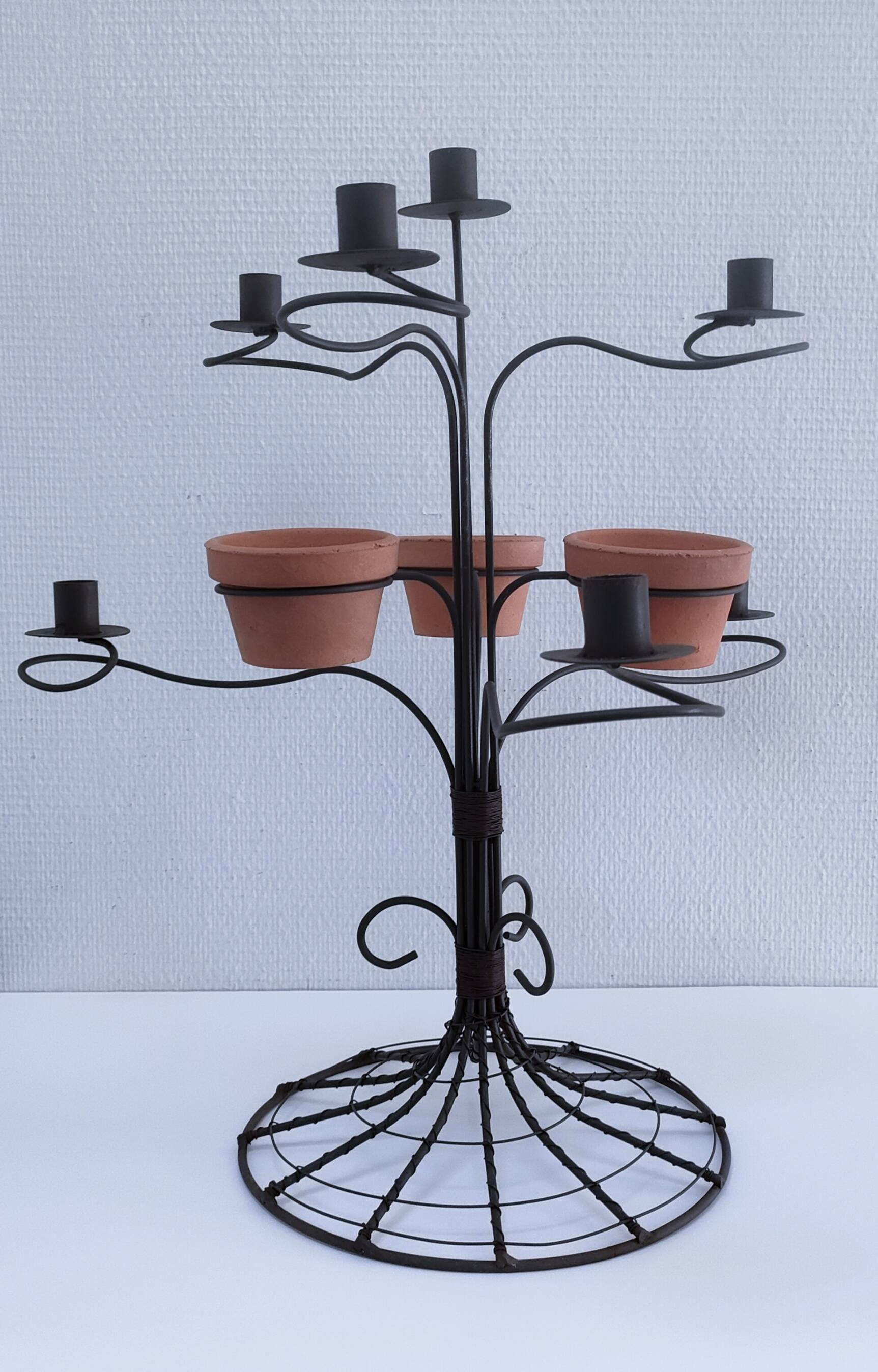 Vintage seven-light terracotta metal candlestick