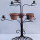 Vintage seven-light terracotta metal candlestick