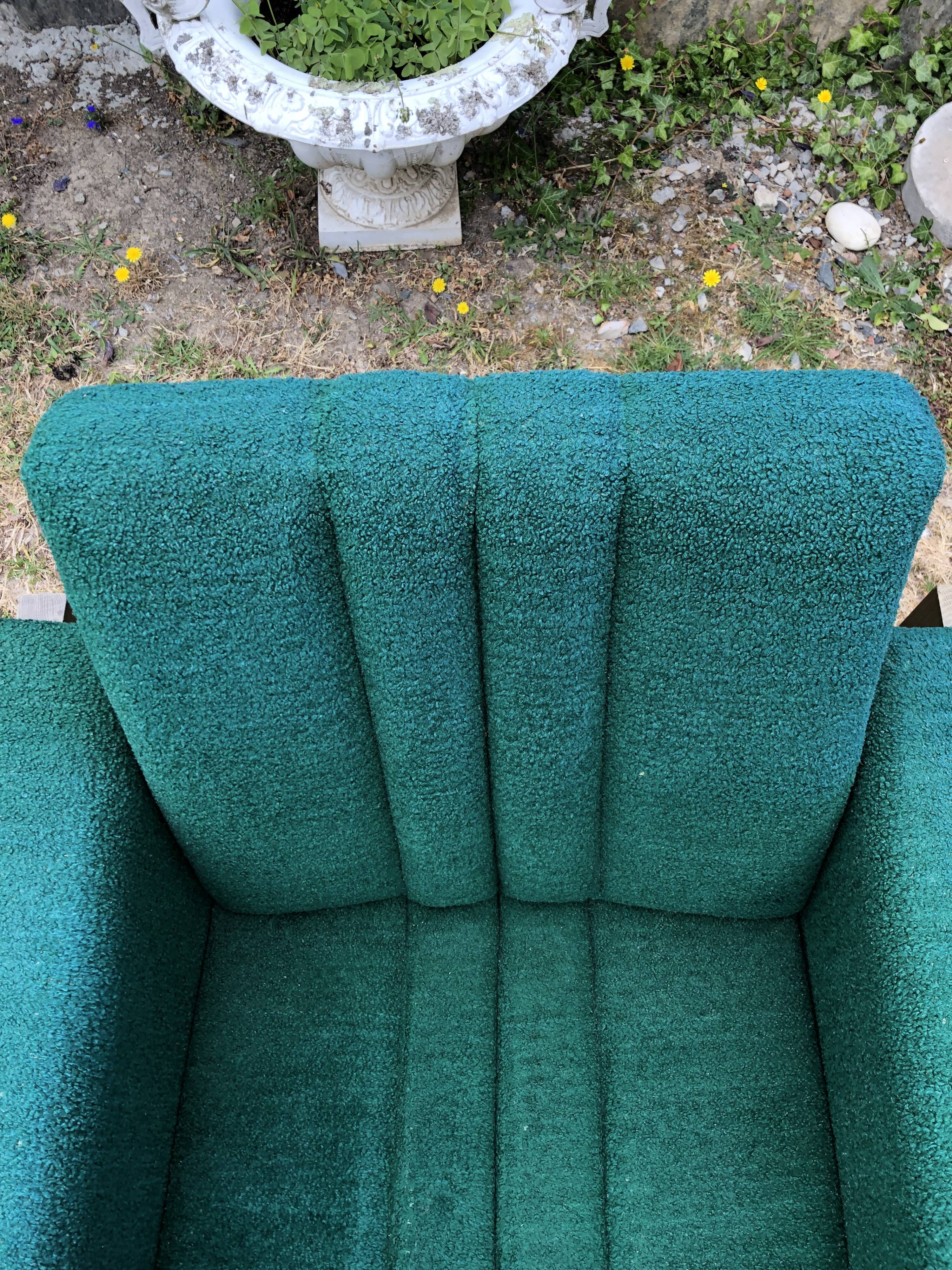 Duo of vintage armchairs with green fabrics.