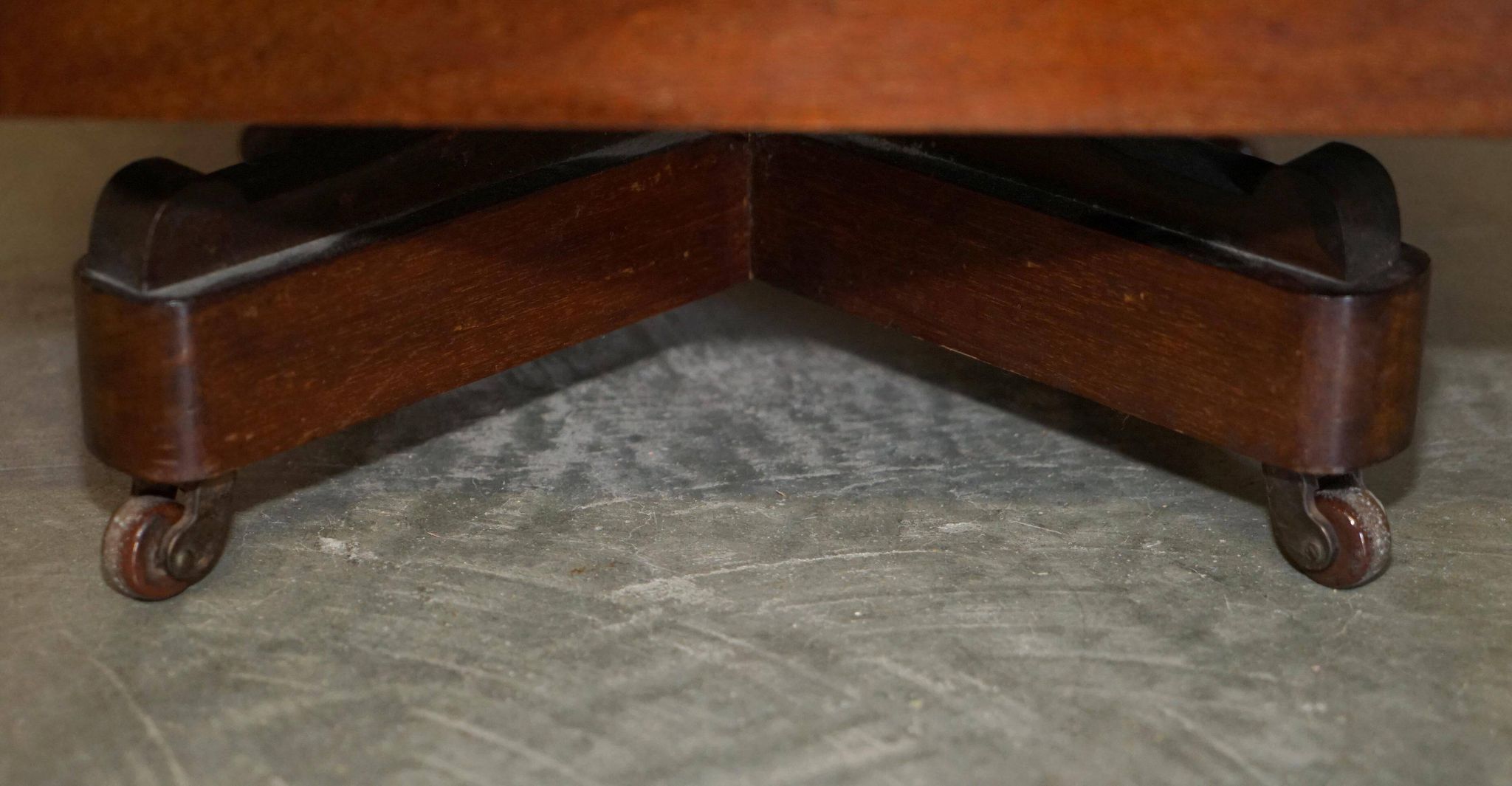 Restored Victorian walnut revolving library.