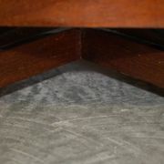 Restored Victorian walnut revolving library.