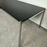 USM Haller T59 table in black laminate and chrome steel