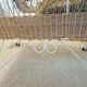 Rattan and wrought iron cradle