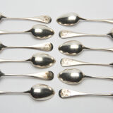 12 small silver metal spoons engraved "FB", early XXth