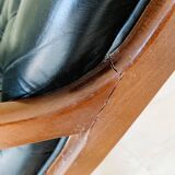 Black leather rocking Chesterfield armchair