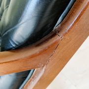 Black leather rocking Chesterfield armchair