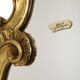 French Baroque-style gold-leaf gilded mirror with crest, 60 cm