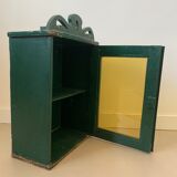 Wall vitrin with pediment