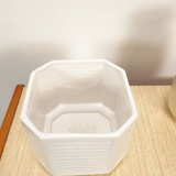 White vintage pot cover with stripes
