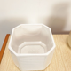 White vintage pot cover with stripes
