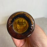 Glass carafe encased in wrought iron