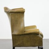 Moss green cow leather Chesterfield wingback armchair in English style