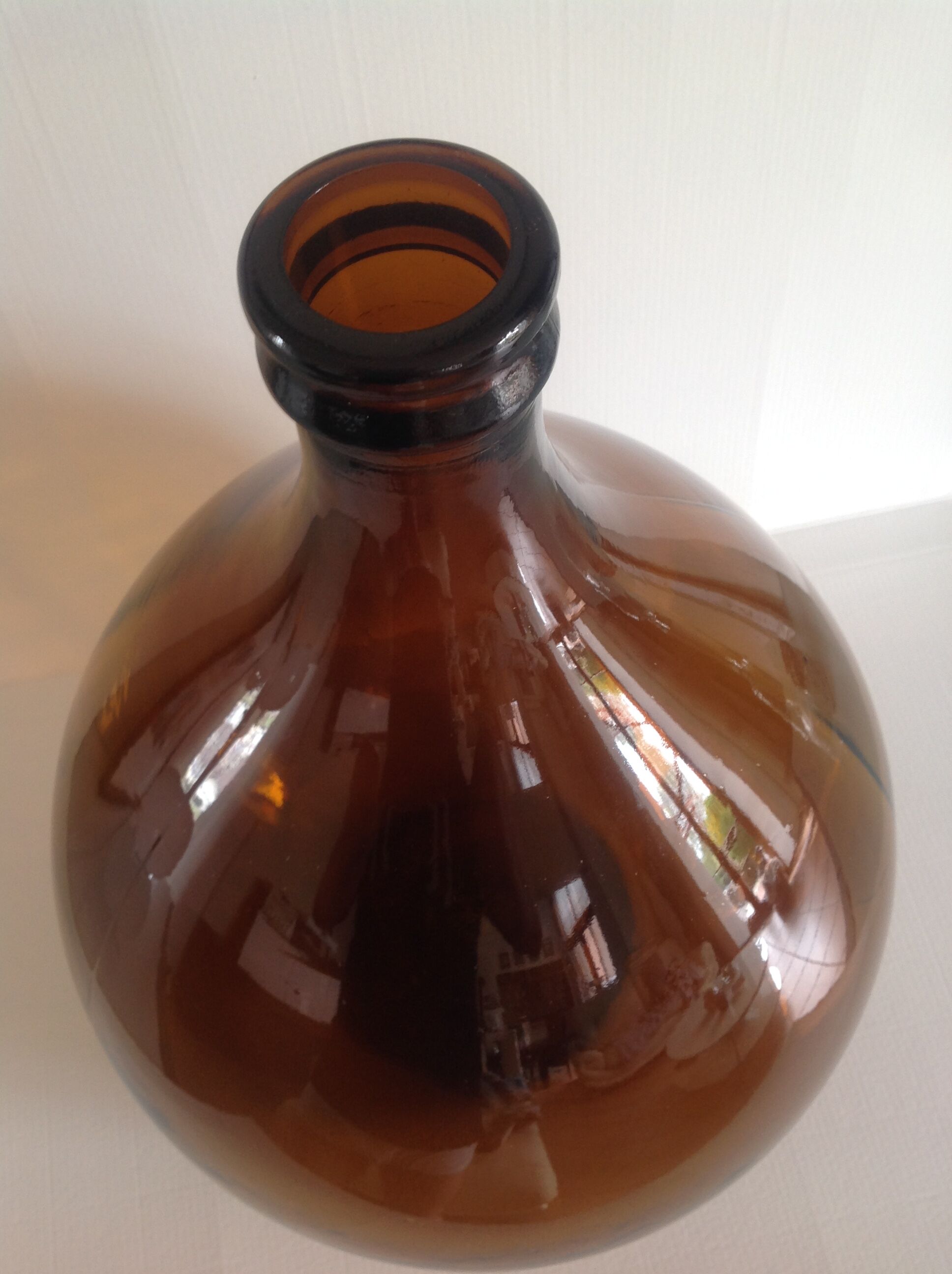 Old demijohn bonbonne smoked glass