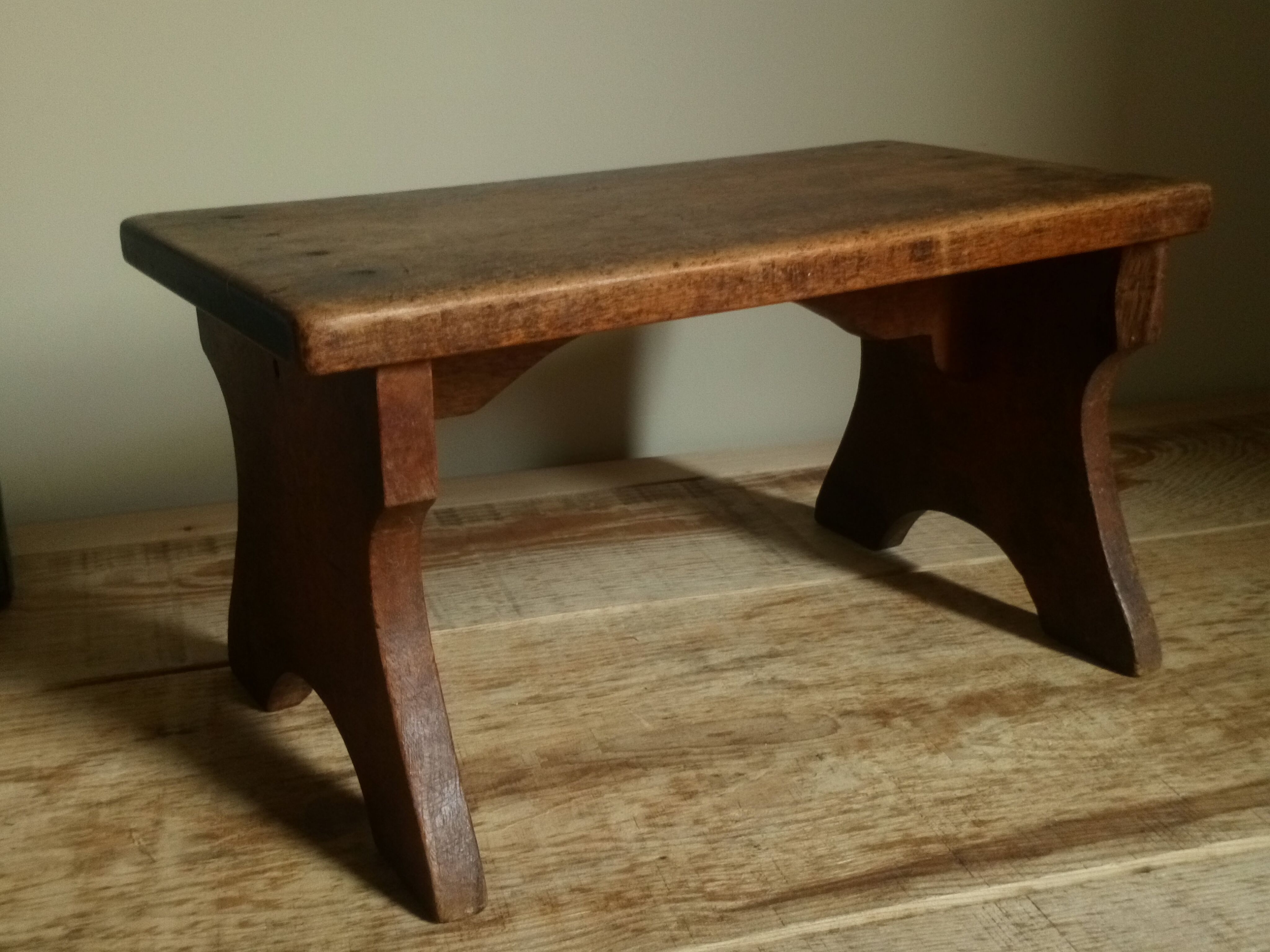 Old solid wood footring bench