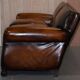 Two-seater canapé in aged leather, Victorian style.