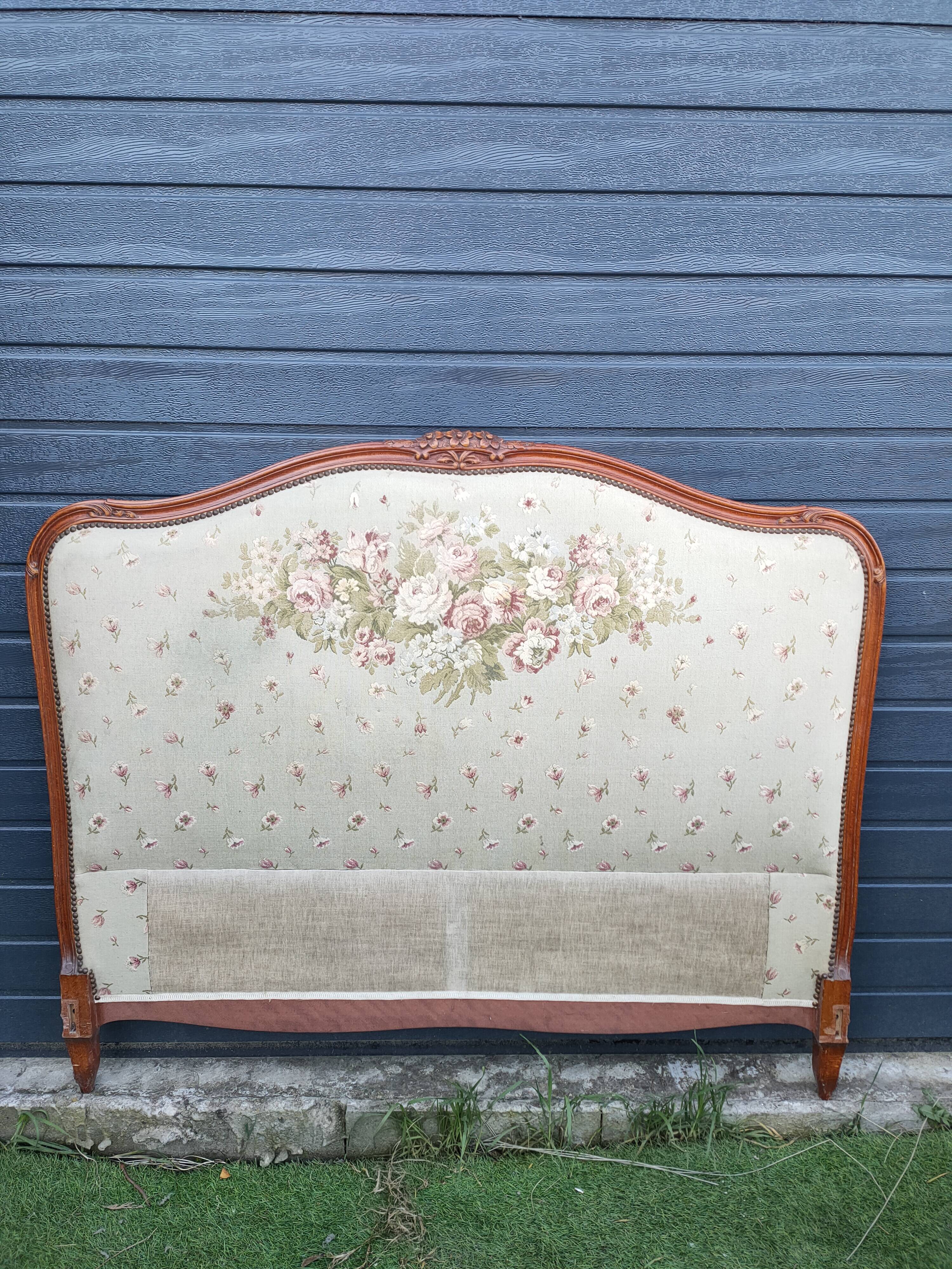 antique fabric and wood headboard