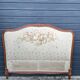 antique fabric and wood headboard