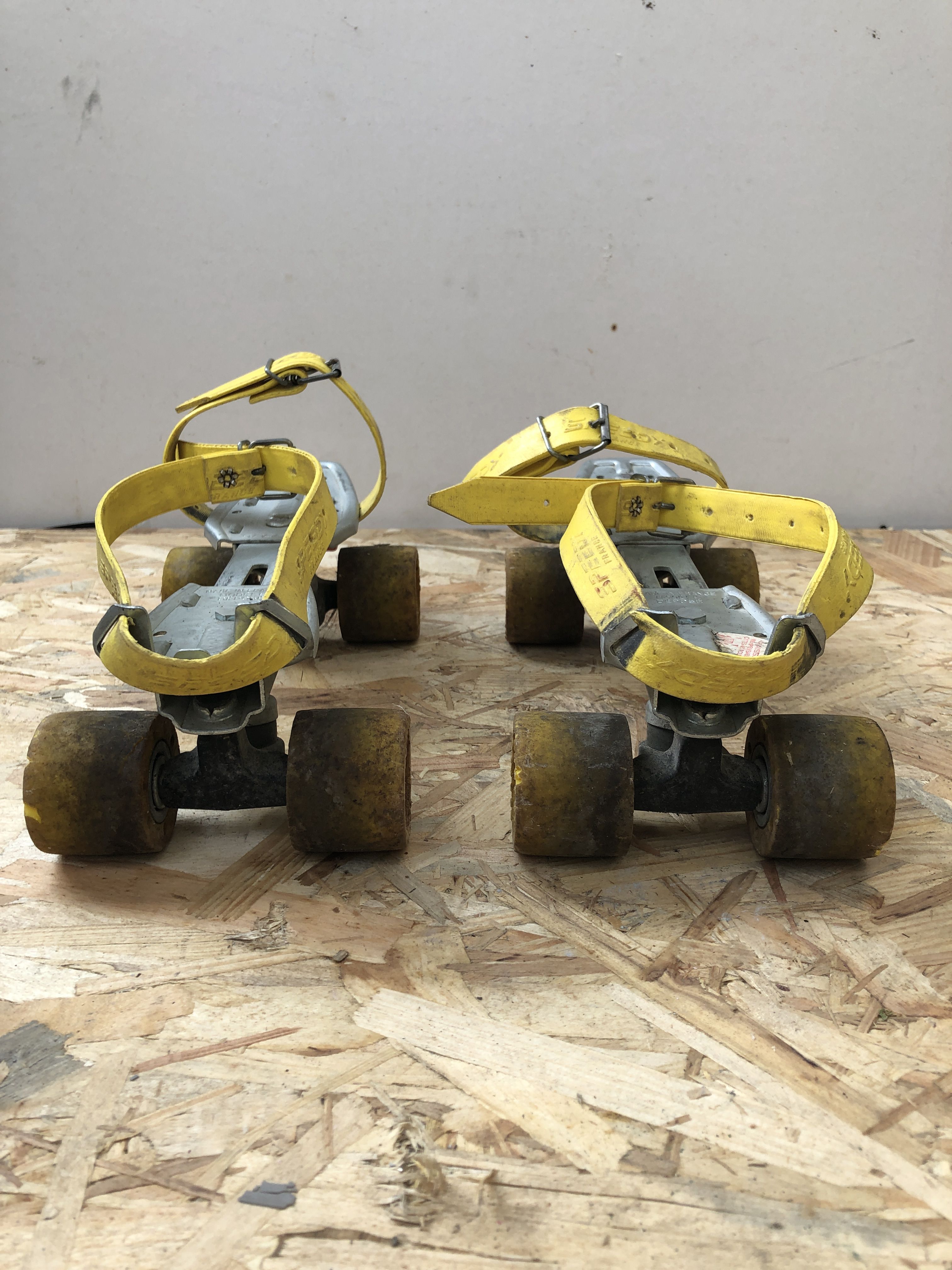 Old pair of speedy metal roller skates grey + straps & vintage brake