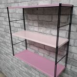 Pink string shelf with black uprights. 47x49x16