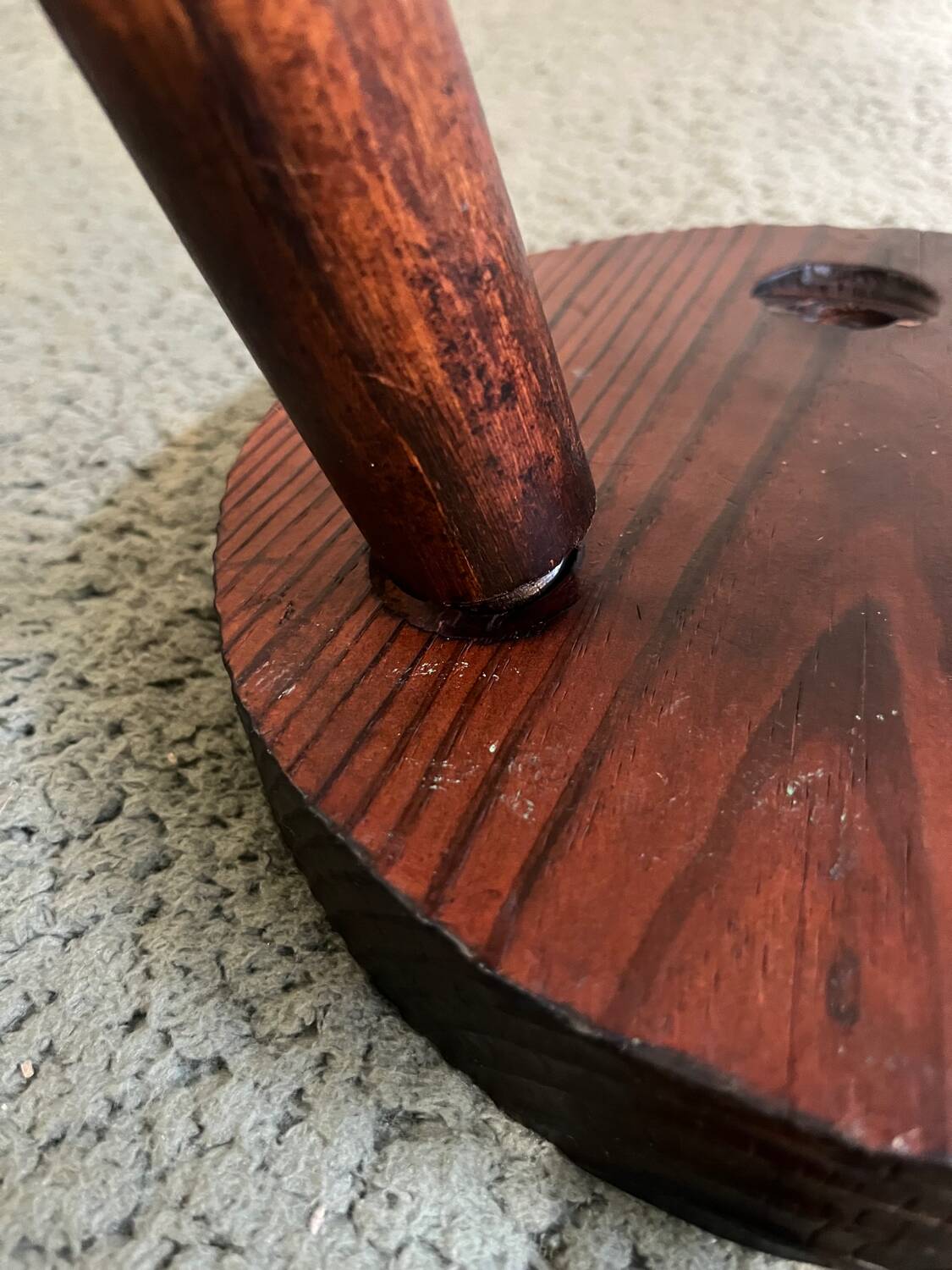 Round wooden tripod stool