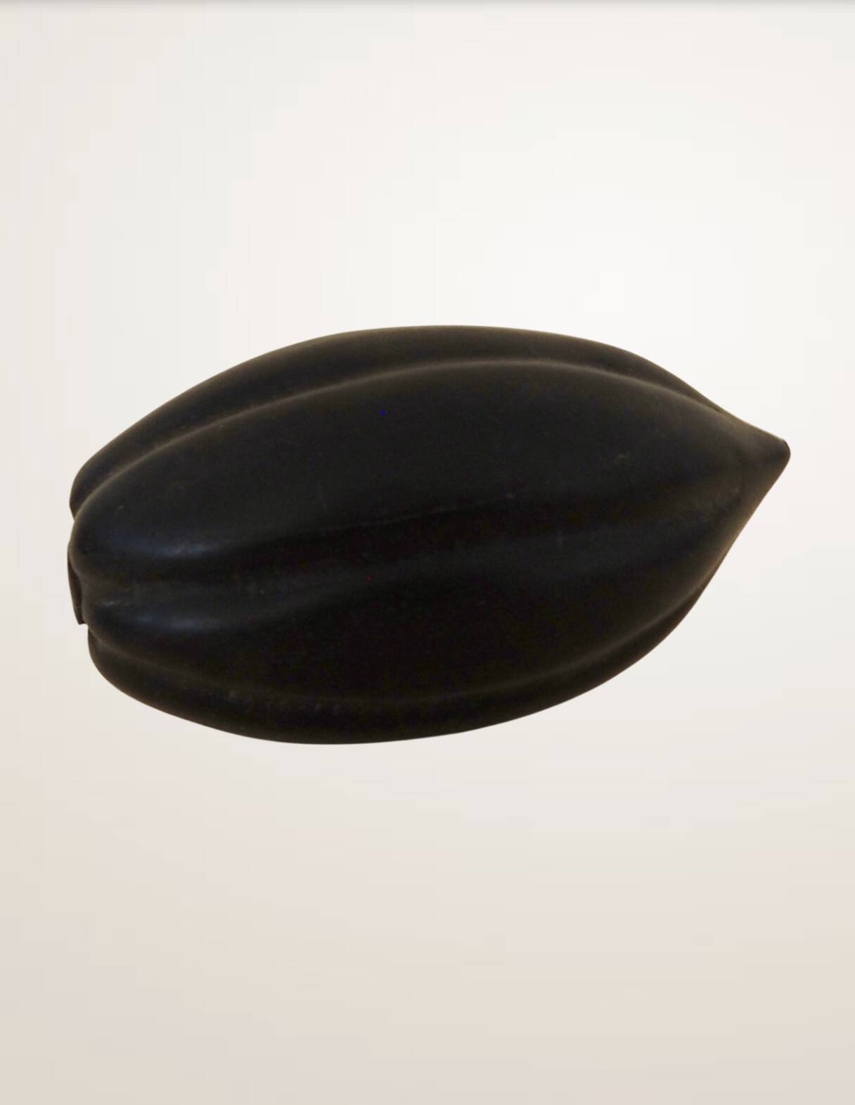 Set of decorative fruits in carved blackened wood.