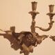 Pair of antique wall sconces in gilded wood from the 19th century.