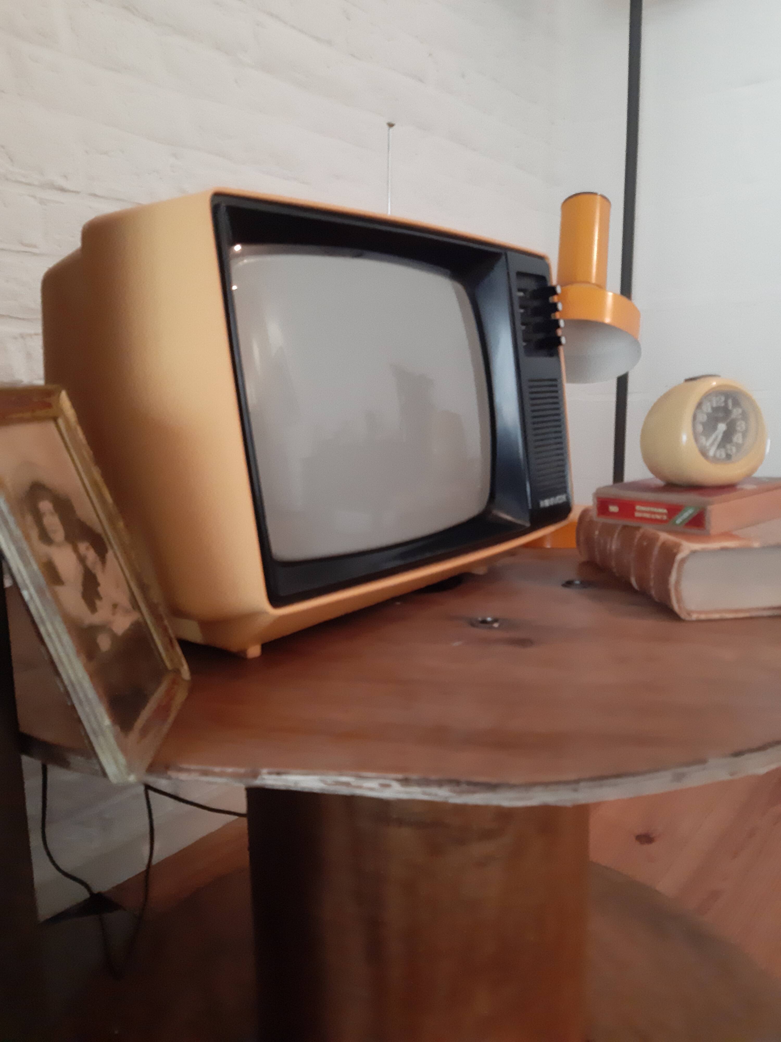Yellow minivox vintage tv