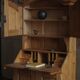 Old Danish secretary in pine with drop-down front and upper cabinet, mid-19th century.