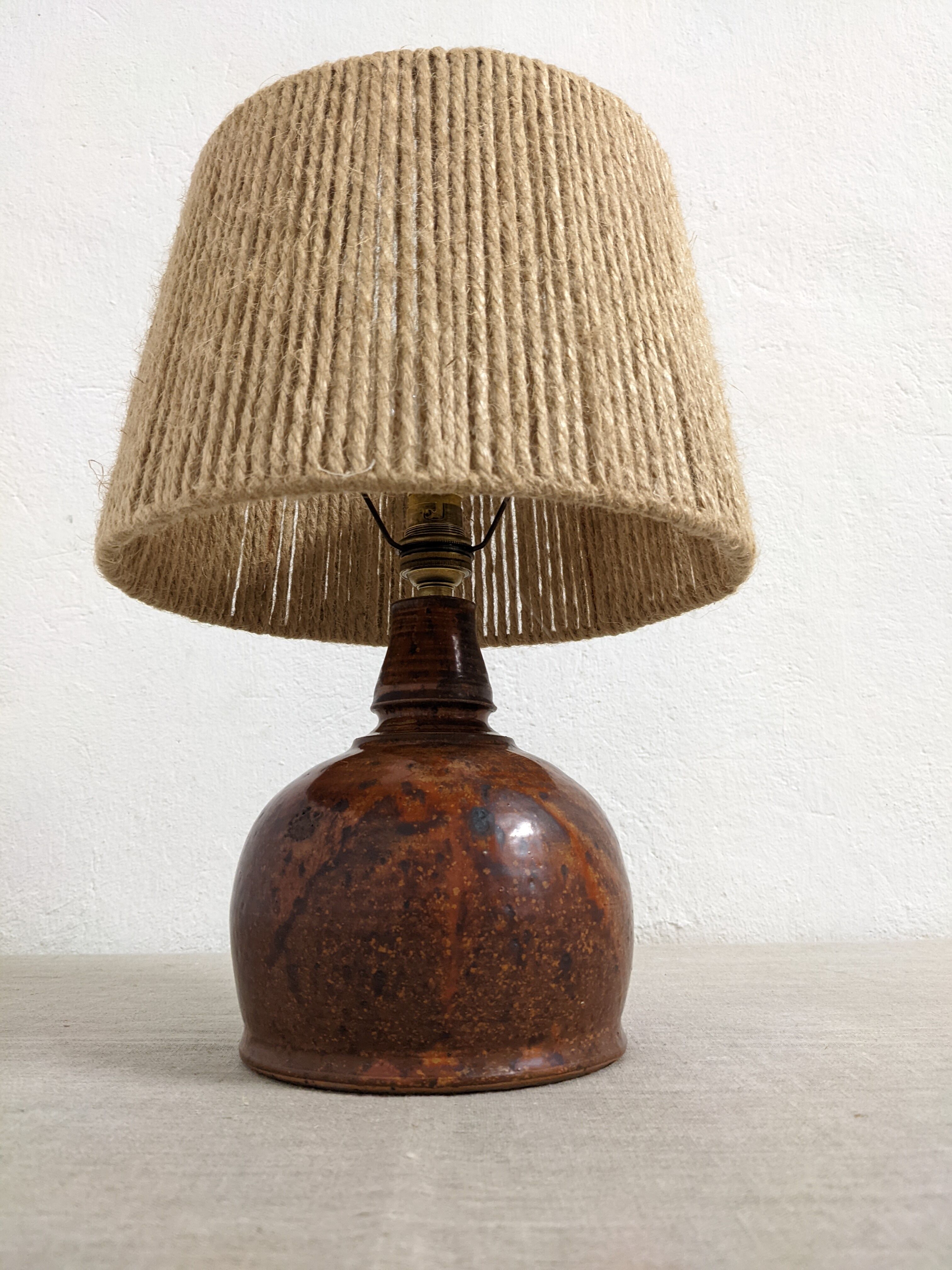 Vintage varnished stoneware lamp and jute rope