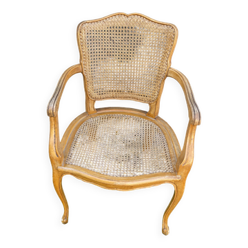 Cane armchair