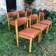 Six wooden and leatherette chairs