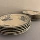 12 dessert plates and an art nouveau dish Royat de Sarreguemines