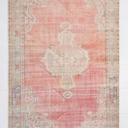 Tapis vintage rouge pâle
