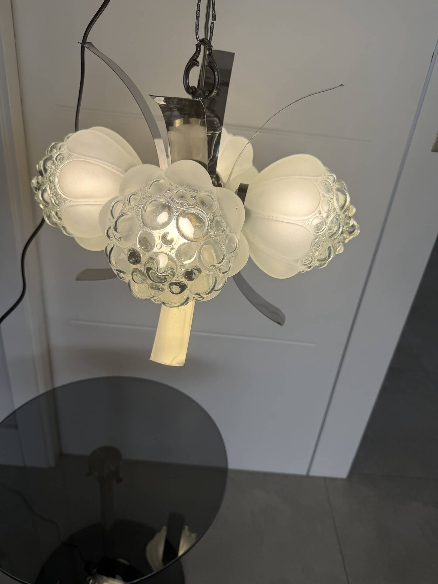 Vintage chandelier with 4 glass bubble globes and silvered metal.