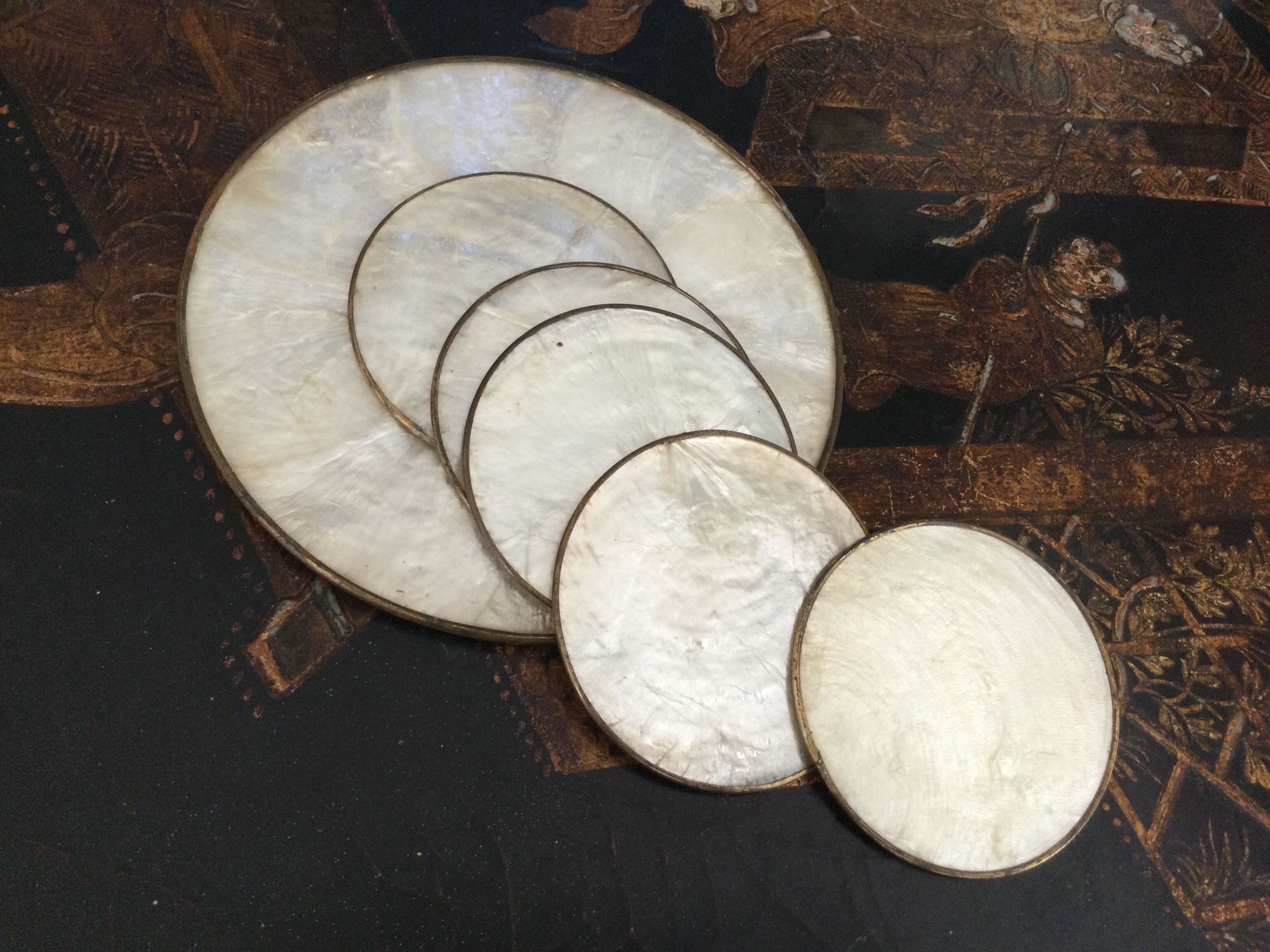 Under vintage glasses in mother-of-pearl