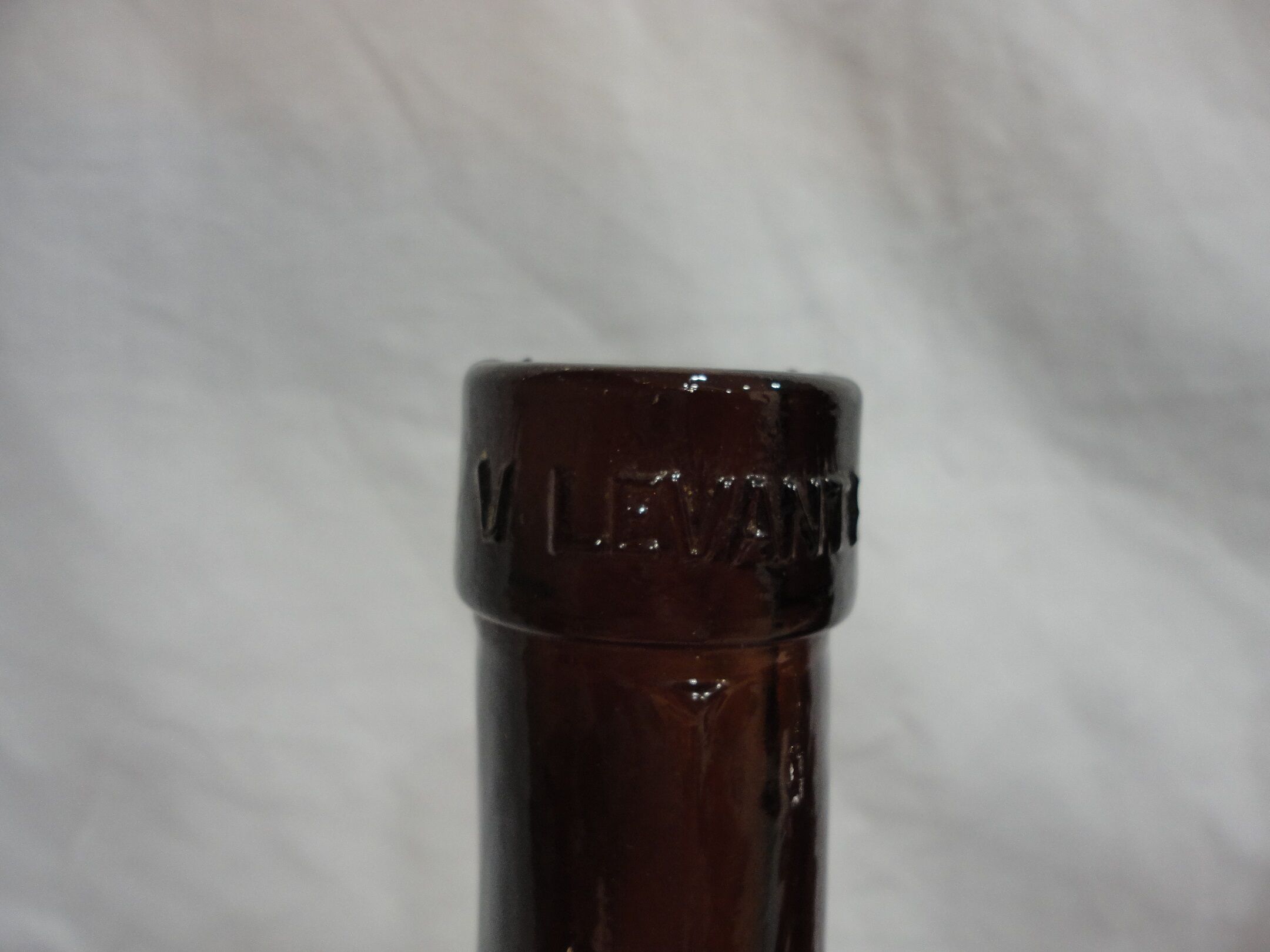 Lot 3 old round bottles
