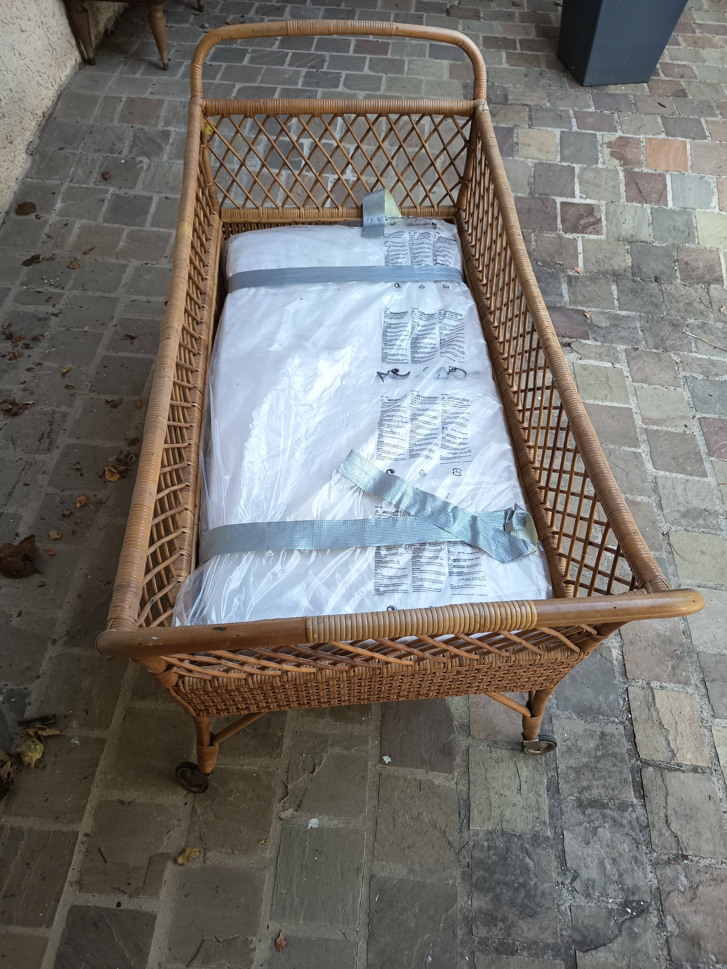 Vintage rattan cradle