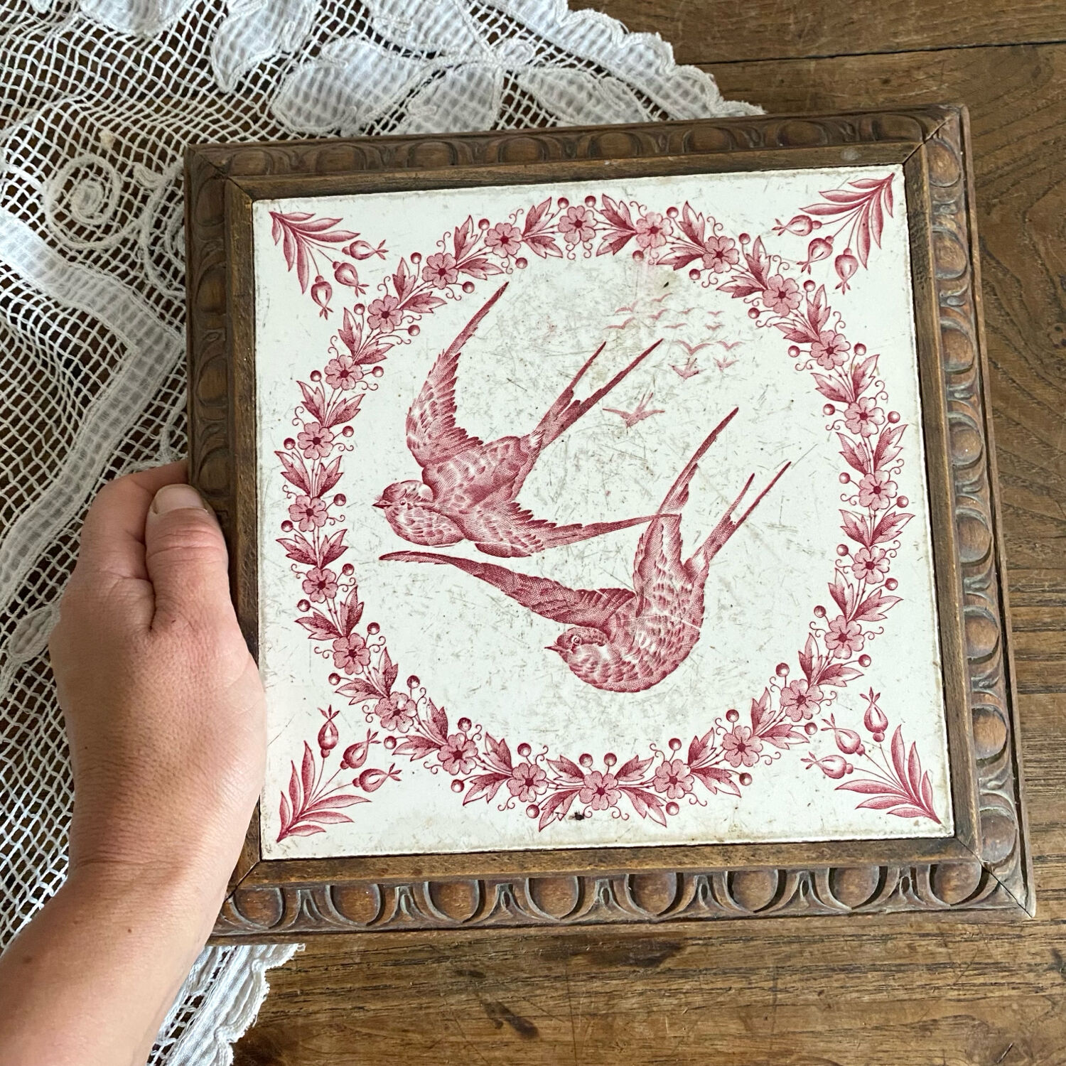 Ironstone trivet with birds