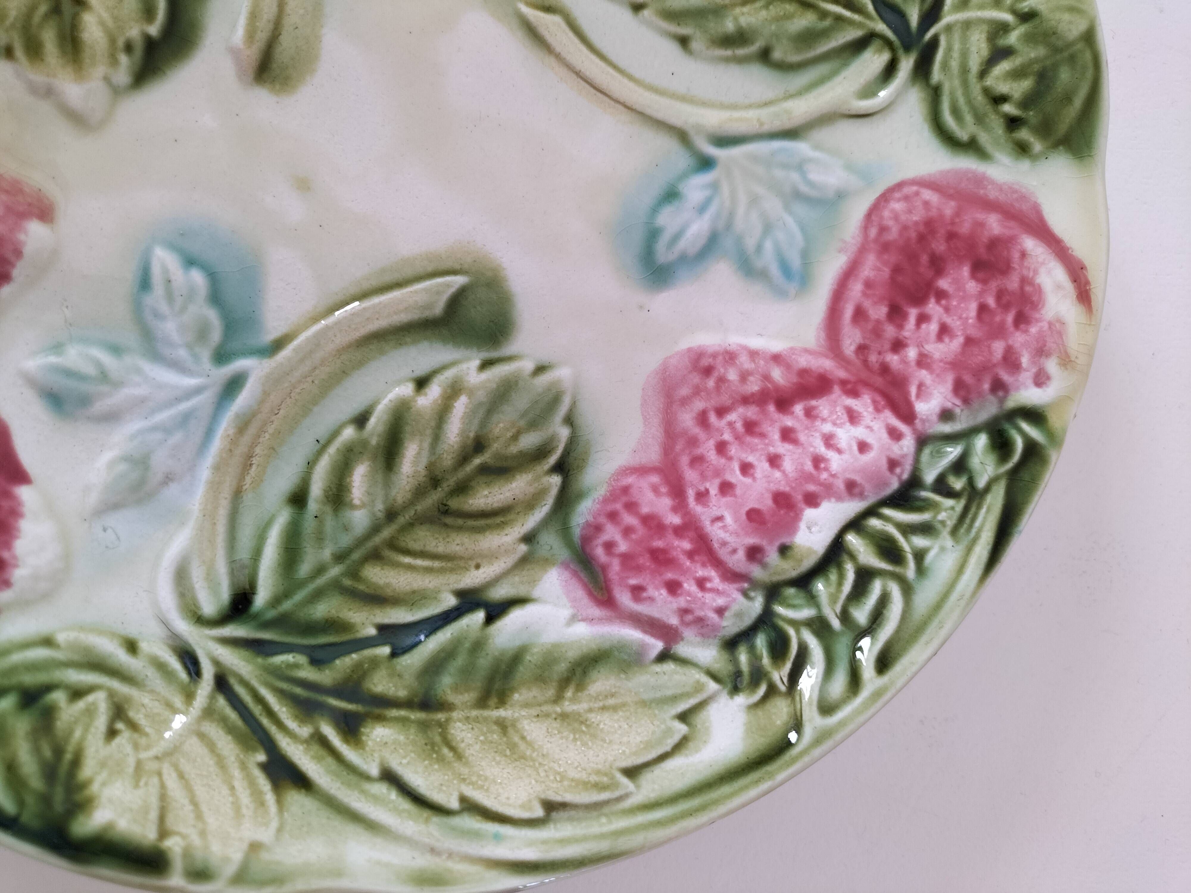 Barbotine plate with strawberries in relief, late 19th and early 20th century