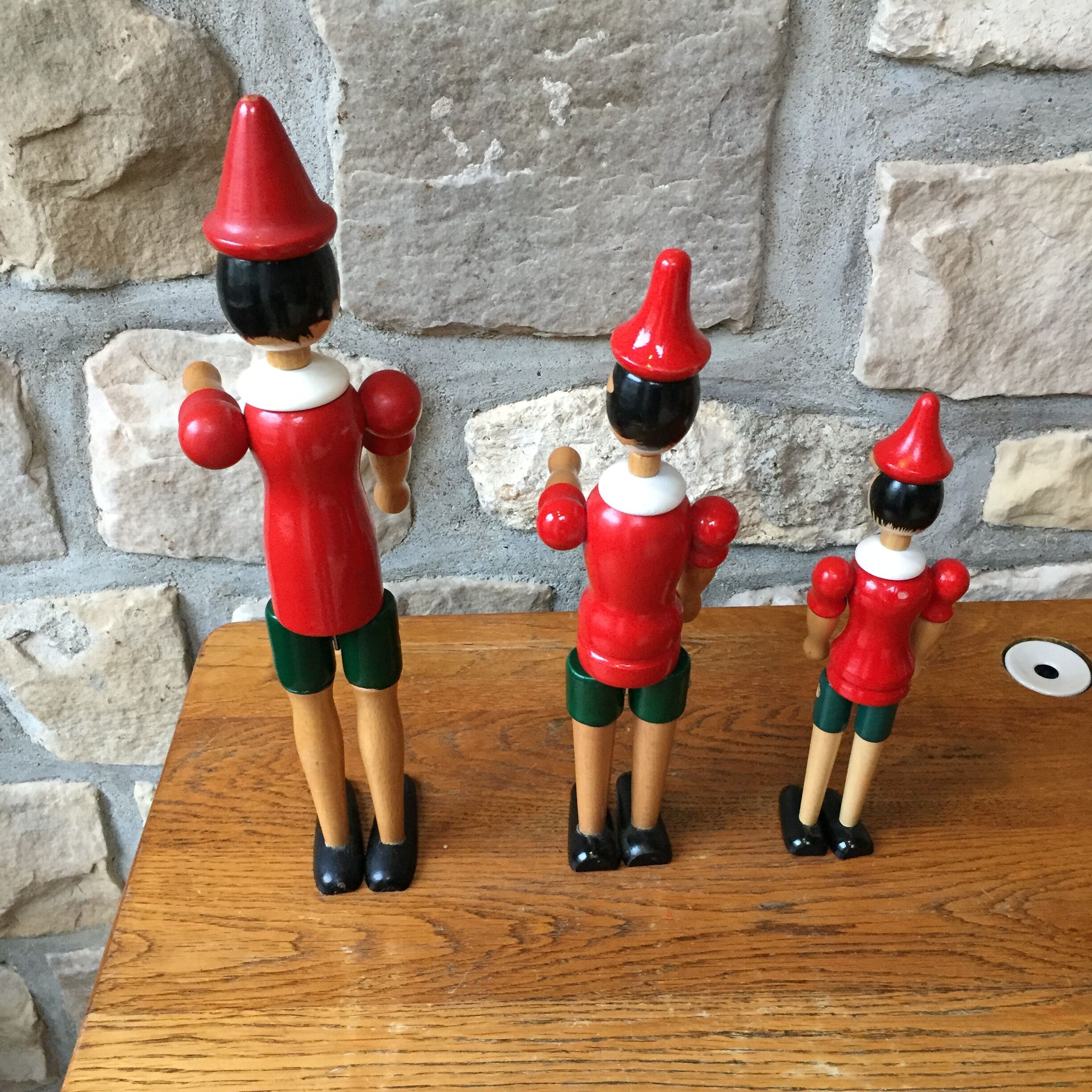 Trio of old wooden Pinocchio Made in Italy