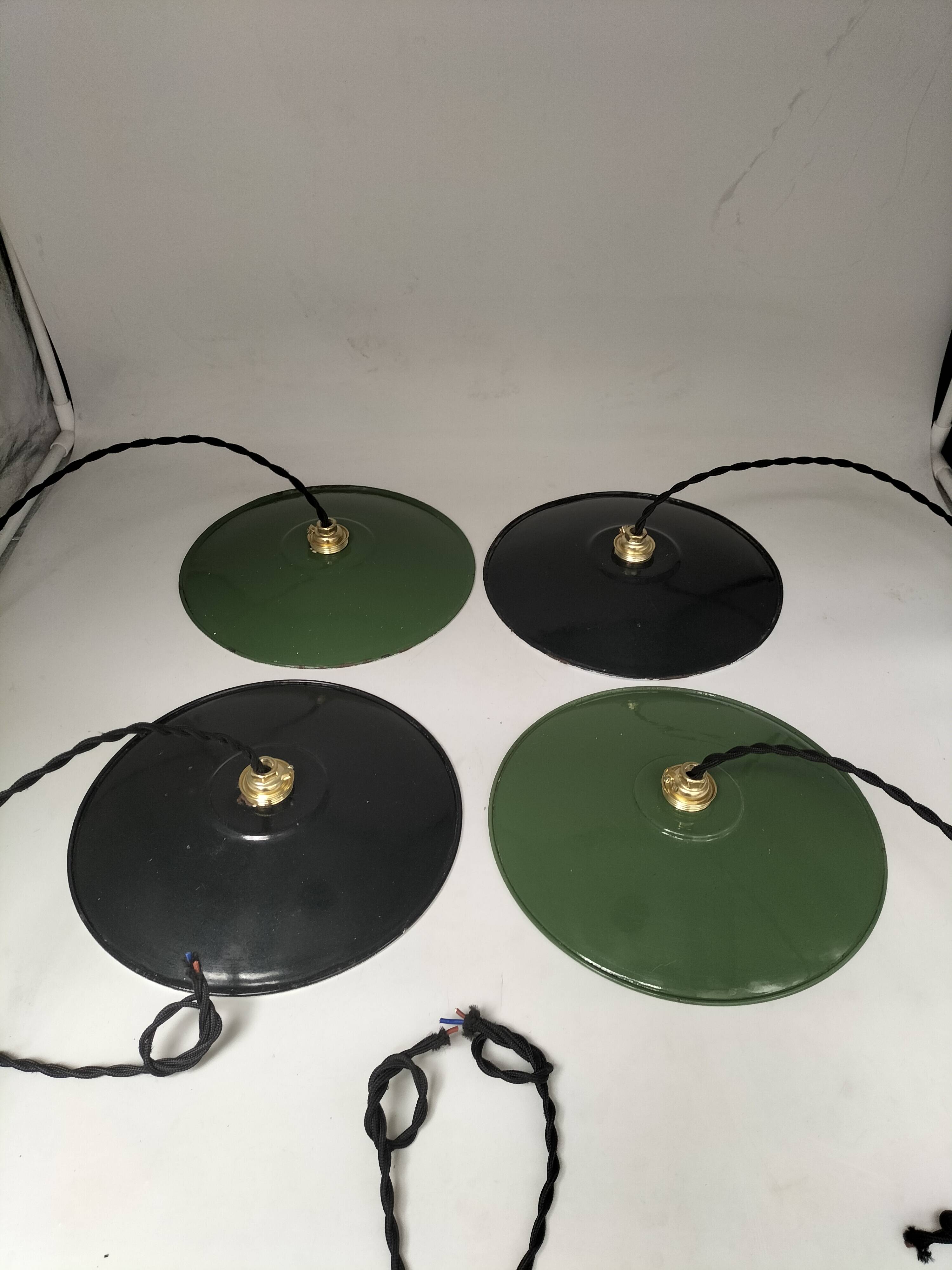 4 enameled sheet metal pendants