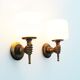 Pair of 1950’s solid brass ‘torch holding hand’ wall sconces by maison arlus