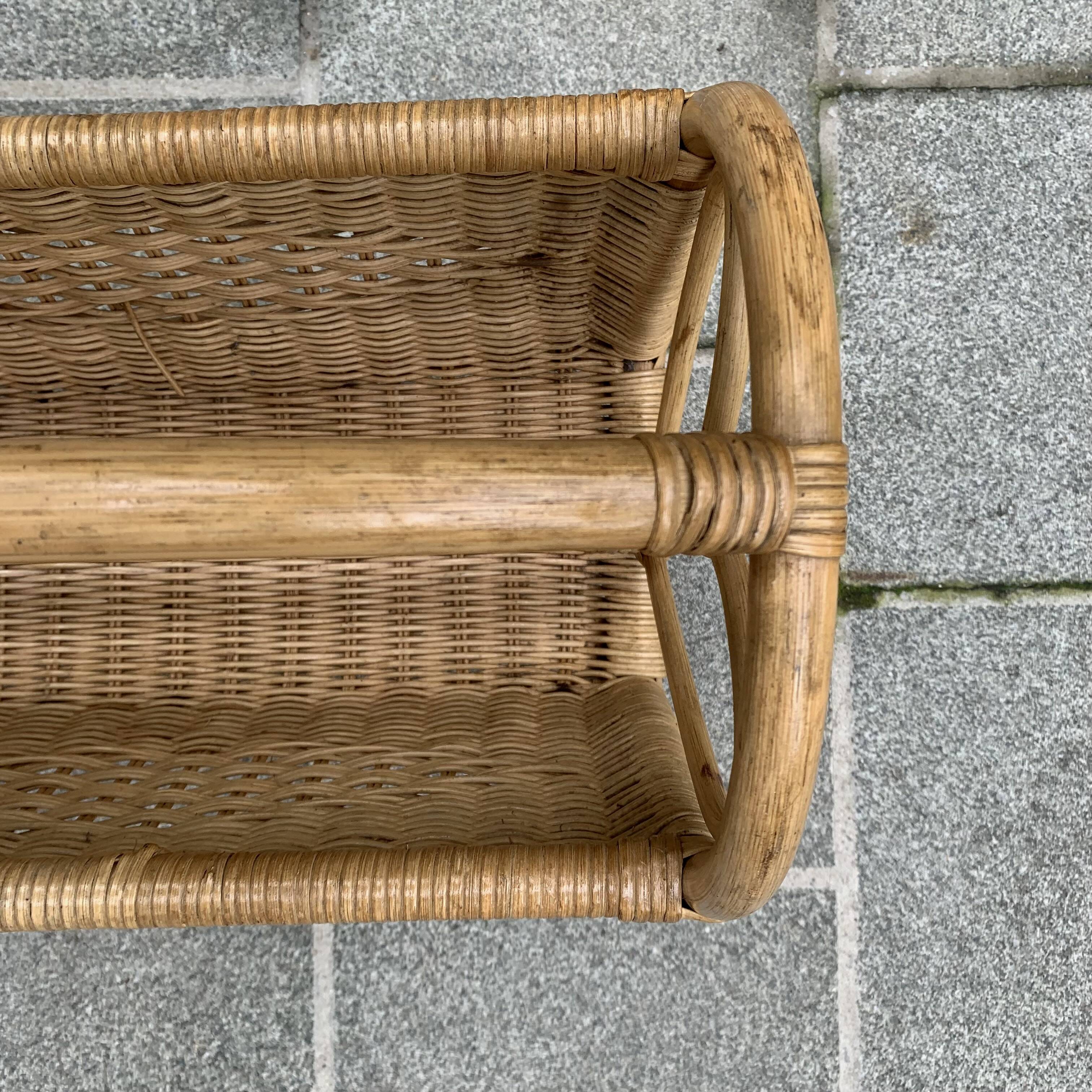 Vintage wicker and bamboo magazine rack