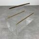 Plexiglass and brass magazine rack from the 70s in Hollywood Regency style.